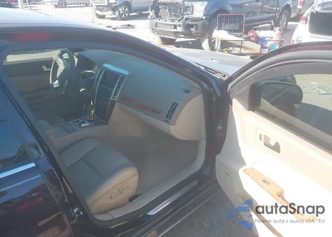 2008 Cadillac Sts V6 z USA, uszkodzony, nr VIN 1G6DW67V880118591